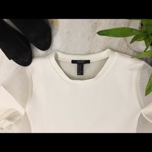 Modern white scuba and mesh top
